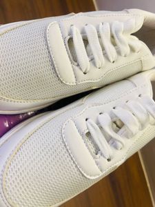 White sneakers branded new