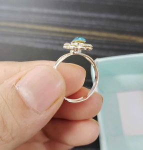 ADJUSTABLE BLUE STONE RING