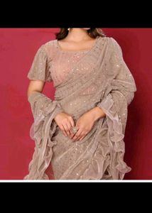 New Ruffle pallu saree with stitched blouse