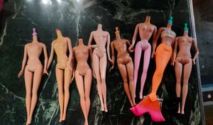 Lot of 8 Barbie Dolls