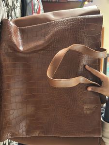 A Big Size Tote Bag With Enough Space For Laptop