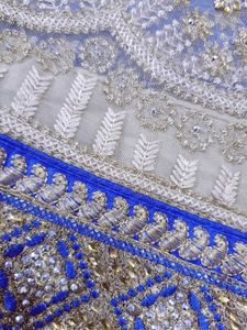 Half net saree with stiched blouse and peticoat