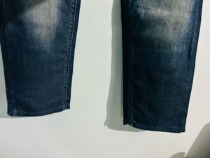 Distressed Denim Jeans with Patches