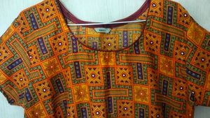 Beautiful Orange Colour Kurti