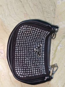 Rimestones Clutch