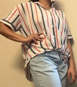 A white with colour striped shirt for women