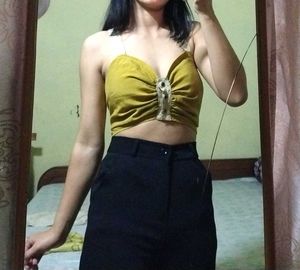 Hardly worn mustard yellow crop top .