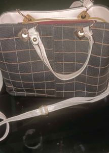 👜