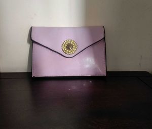 Sling Bag with Detachable Strap.