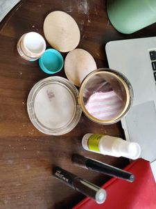 Empty Bottles And Compact Puffs For Re-use