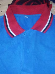 Blue Polo with Red and White Trim
