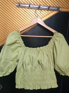 Sage green crop top with puff sleeves