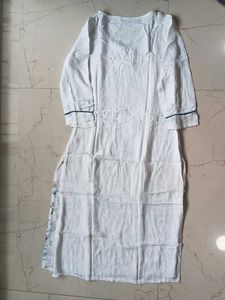 White kurta with beautiful floral work on it