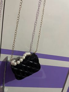 Black Hand + Sling Bag