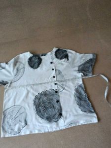 White Breezy top But one Sleeves Has flaws