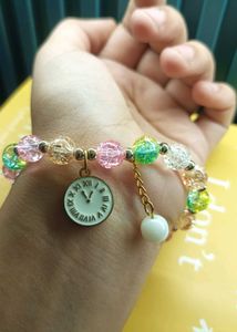 Beaded multicolour clock charm bracelet
