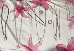 Nice fancy necklaces with chains and 2 fingure rin