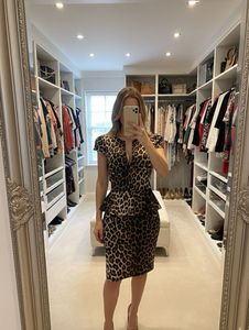 Animal Print Peplum Bodycon Dress