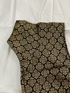 Pretty Black Saree With Golden Border..