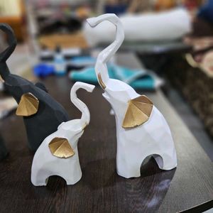 Elephant Charm Statues in Varying Sizes