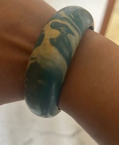 combo of wooden, golden and designer bangles