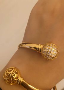Twisting Gold Color Bangle