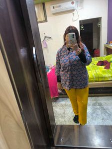 Mustard yellow churidar pant.