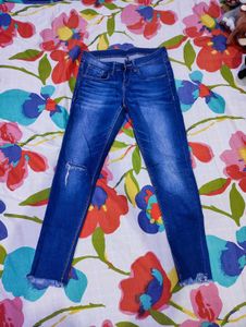 Ripped Knee Denim Jeans