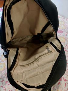 Black Backpack with Charm Detail