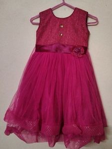 Pink Net Dress With Proper Lining Inside.