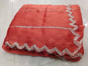 Elegant Red Saree with Silver Embellishments