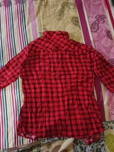 red and black check shirt