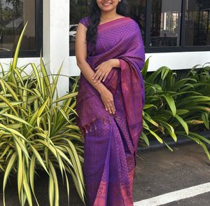 Its A Beautiful Purple Saree With Pretty Blouse