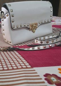 Cream Leather Exterior Bag.