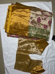 Saree And Stitched Blouse