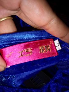 beautiful blue velvet dress knows as Chinese dres