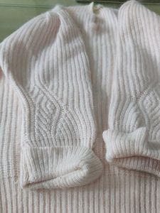 light pink sweater for cozy winters.