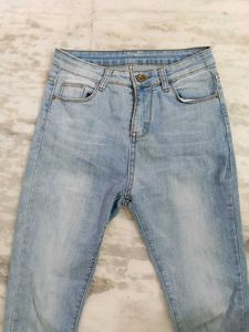 Light Wash Distressed Hem Jeans