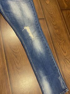 Distressed Denim Jeans