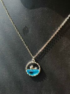 Silver Bow Pendant Necklace