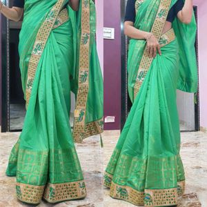 Elegant Green Silk Saree with Elephant Border