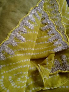 Yellow Bandhani Saree with Silver Border