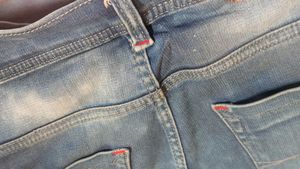 Distressed Blue Denim Jeans