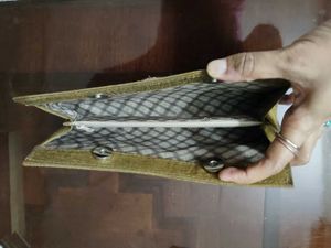Handmade artisanal mustard clutch: Unused