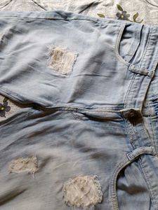 Short Ankle Length Ripped Jeans For Women