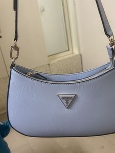 GUESS Women Solid Half Moon Fringed Shoulder bag