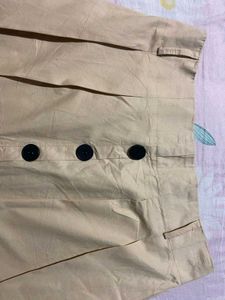 It Is a Cute Brown Skirt With Buttons