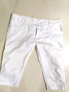 A White Knee Length Jeans
