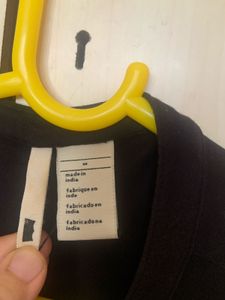 Levi’s Black Ruffled Neck Top