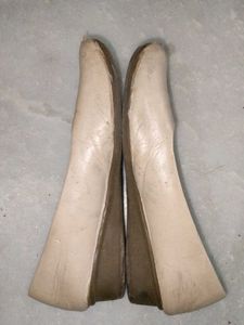 Worn Beige Ballet Flats